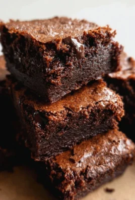 Delicious homemade Cake Mix Brownies topped with chocolate chips.