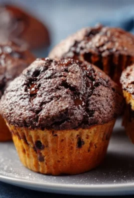 Delicious homemade Chocolate Chunk Muffins made from cake mix.