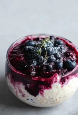 Delicious blueberry cheesecake oats topped with fresh blueberries and creamy texture