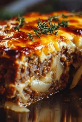 Delicious and hearty easy French Onion Meatloaf served on a plate