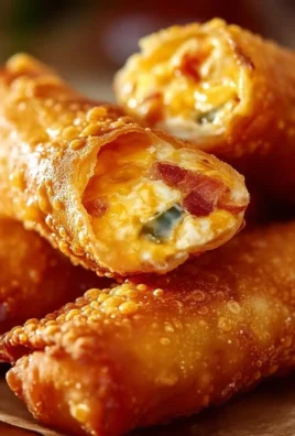 Crispy jalapeno popper egg rolls filled with cheese and jalapenos