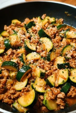 Ground Turkey and Zucchini Skillet dish served in a skillet with herbs