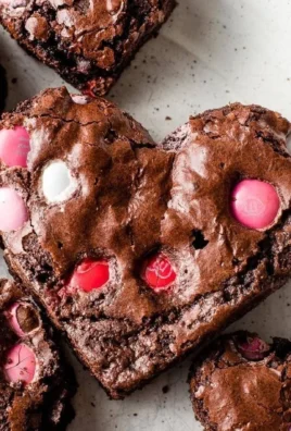 Delicious heart shaped brownies on a plate, perfect for sharing and gifting.