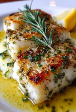 Quick and easy cod fish with herb butter served on a plate
