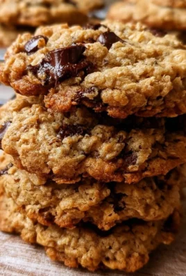 Baking Vegan Oatmeal Chocolate Chip Cookies on a wooden table